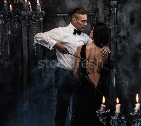 Woman with violin body art and man holding bow  Stock photo © Nejron