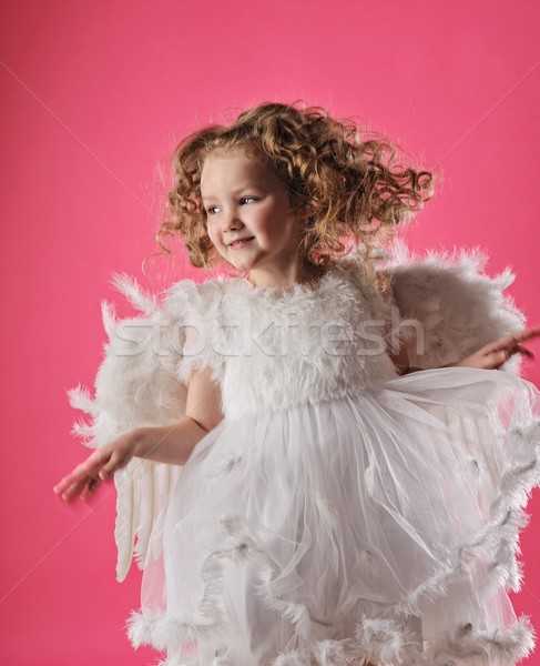 Bella piccolo angelo ragazza isolato rosa Foto d'archivio © Nejron