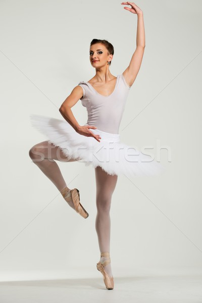 Young ballerina dancer in tutu showing her techniques  Stock photo © Nejron