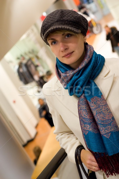 Lovely lady on escalator in shopping mall Stock photo © Nejron