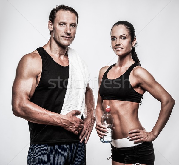 Sportos pár fitnessz testmozgás nő tornaterem Stock fotó © Nejron