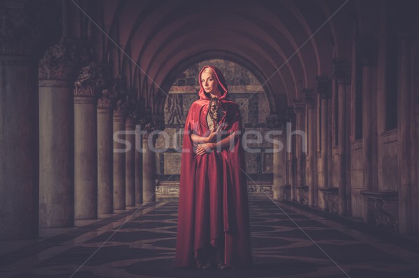 Woman with a mask wearing red cloak outdoor Stock photo © Nejron