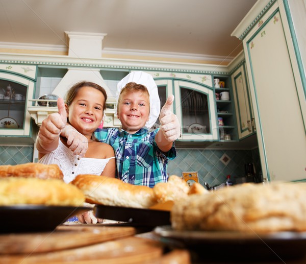 Happy children cooking homemade pastry Stock photo © Nejron