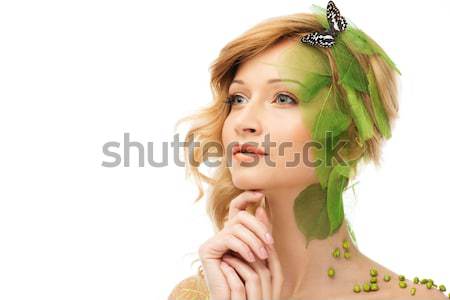 Dreaming young woman in conceptual spring costume with butterfly Stock photo © Nejron