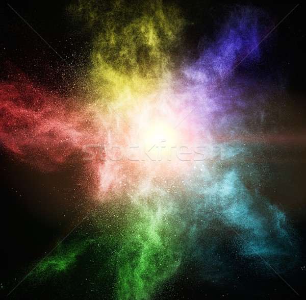 Colourful powder exploding isolated on black Stock photo © Nejron