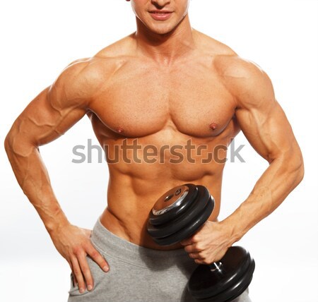 Przystojny mężczyzna muskularny tułowia wagi sportu Zdjęcia stock © Nejron