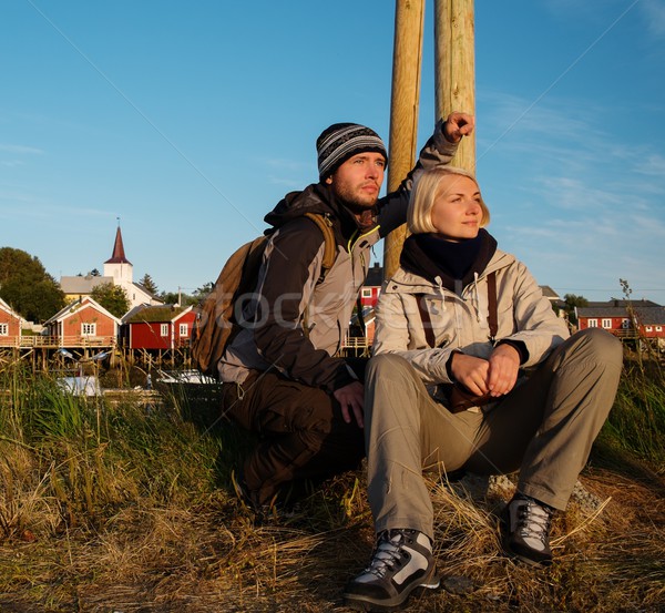 Young travellers couple in Reine village, Norway Stock photo © Nejron