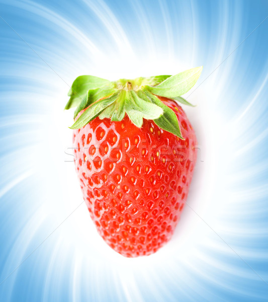 Ripe strawberry over abstract blue background Stock photo © Nejron