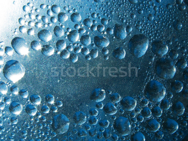 Abstract background. Liquid on dirty glass Stock photo © Nejron