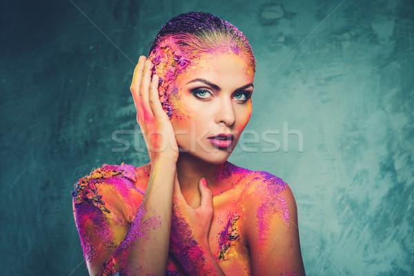 Beautiful young woman with conceptual colourful body art  Stock photo © Nejron