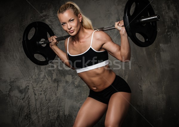 Stock foto: Schönen · muskuläre · Bodybuilder · Ausübung · Gewichte · Frau