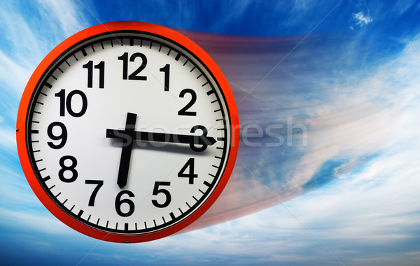 Flying clock Stock photo © Nejron