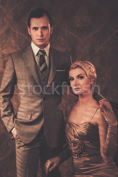 Well-dressed couple in retro interior Stock photo © Nejron