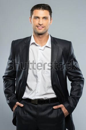 Knap jonge man zwart pak witte shirt geïsoleerd Stockfoto © Nejron