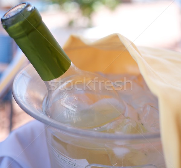 Bottle of a white wine in a cooler Stock photo © Nejron