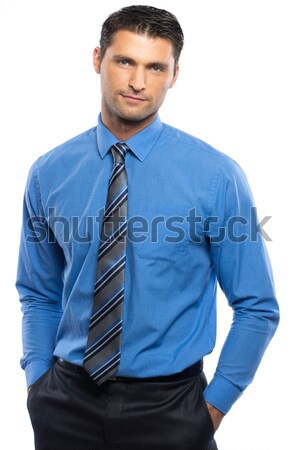 Handsome young man in blue shirt and tie isolated on white background  Stock photo © Nejron