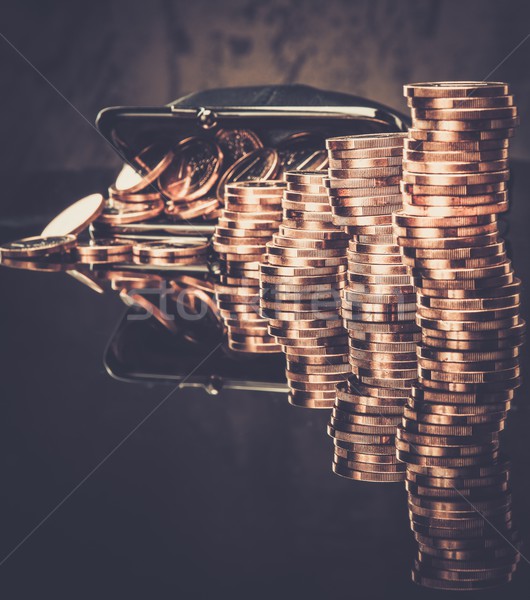 Stock photo: Purse with lot of euro coins 