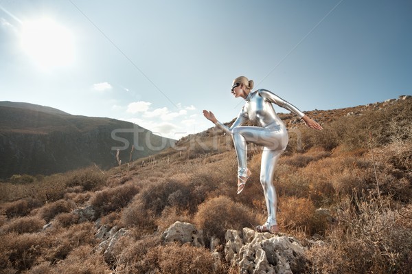 Femme montagnes ciel mode coucher du soleil paysage [[stock_photo]] © Nejron