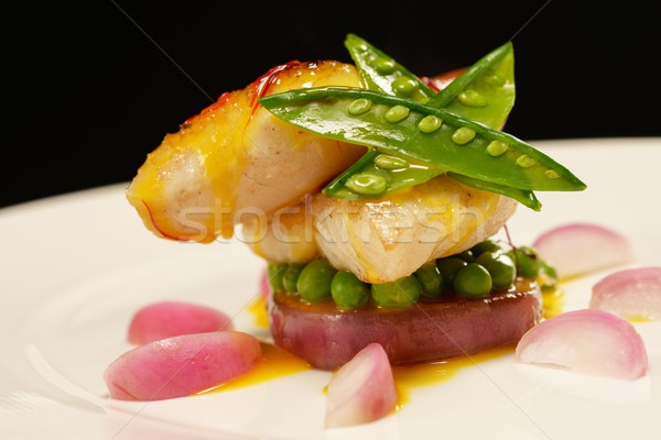 Stock photo: White fish fillet in sauce with radish and pies 