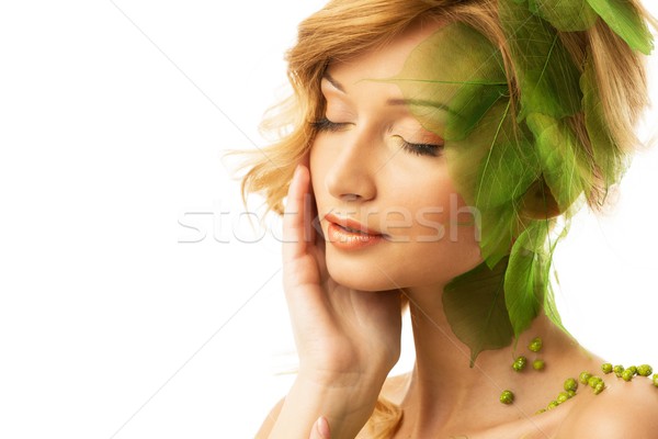 Dreaming young woman in conceptual spring costume  Stock photo © Nejron