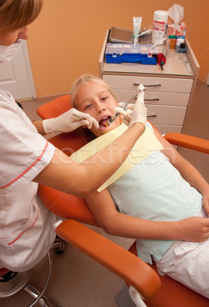 Teenage girl at the dentist. Stock photo © Nejron