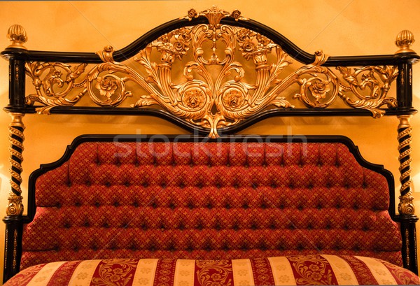 Back of expensive sofa with golden ornament Stock photo © Nejron