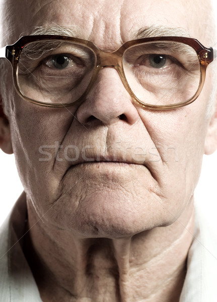 Elderly man with massive glasses Stock photo © Nejron
