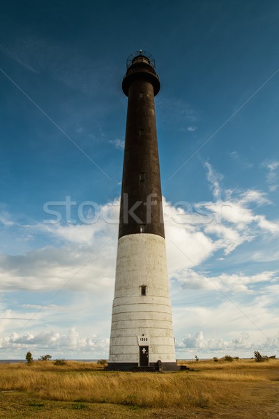 Lighthouse against  beautiful cloudscape  Stock photo © Nejron