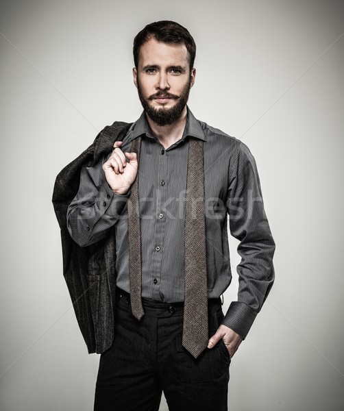 Handsome man with beard and jacket  Stock photo © Nejron