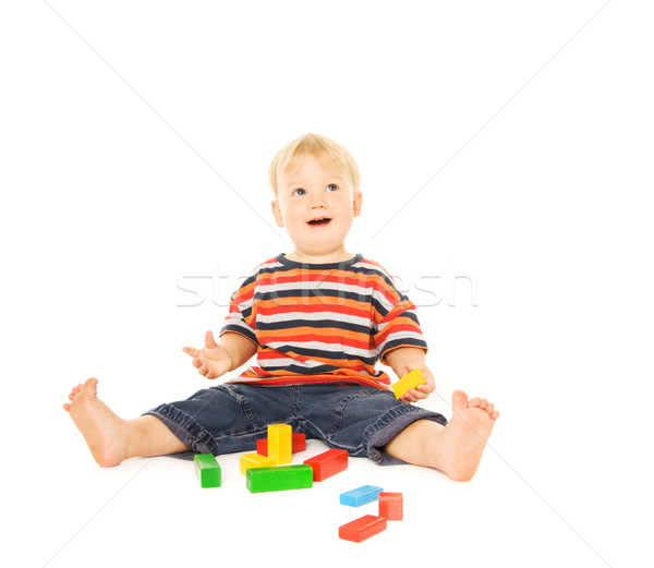 Beautiful young child playing intellectual game. Isolated on whi Stock photo © Nejron