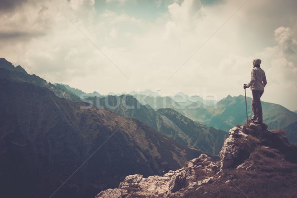 Kobieta turysta górę górskich człowiek spaceru Zdjęcia stock © Nejron