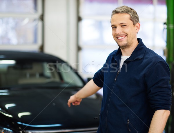 Cheerful man on a car wash Stock photo © Nejron