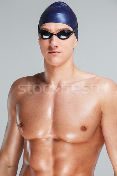 Young athletic man  in swimming cap and googles  Stock photo © Nejron
