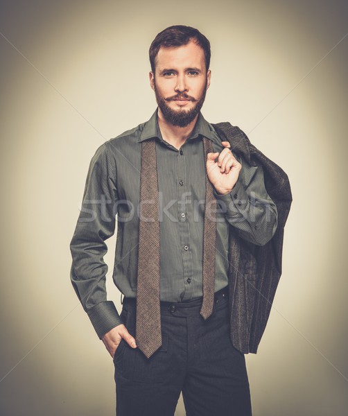 Przystojny mężczyzna kurtka ramię moda biznesmen garnitur Zdjęcia stock © Nejron