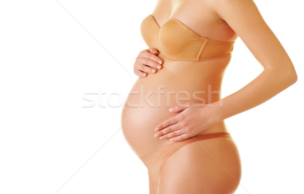 Belo corpo mulher grávida mão bebê saúde Foto stock © Nejron