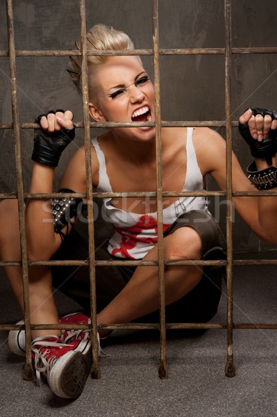 Punk menina atrás barras mulher pintar Foto stock © Nejron