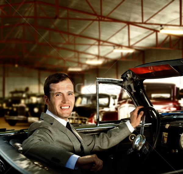 Man behind wheel in a retro car Stock photo © Nejron