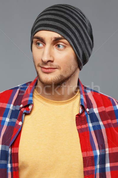 Stylish young man in shirt and beanie hat Stock photo © Nejron