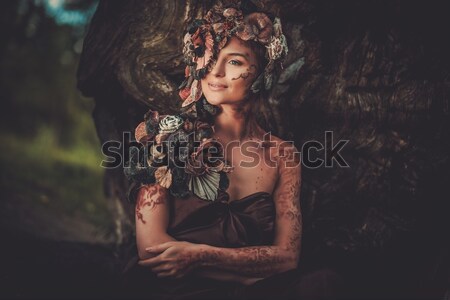 Stock photo: Tattooed beautiful woman in old spooky interior