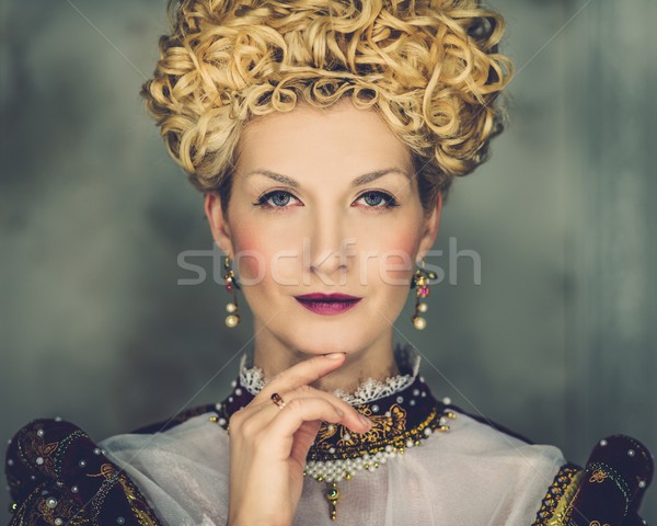 Portrait of beautiful haughty queen in royal dress Stock photo © Nejron
