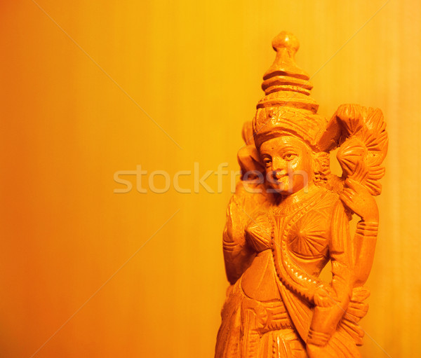 Oriental statue in gradueted orange light Stock photo © Nejron