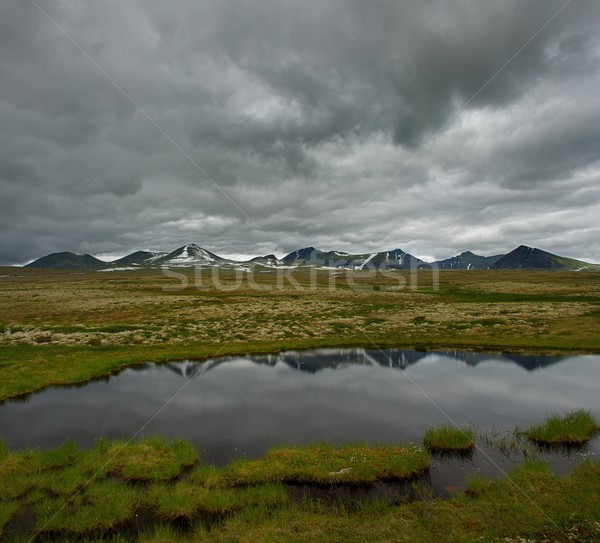 Faible étang montagnes nuages paysage vert [[stock_photo]] © Nejron