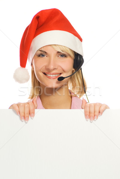 Mrs. Santa with a headset and white noticeboard isolated on whit Stock photo © Nejron