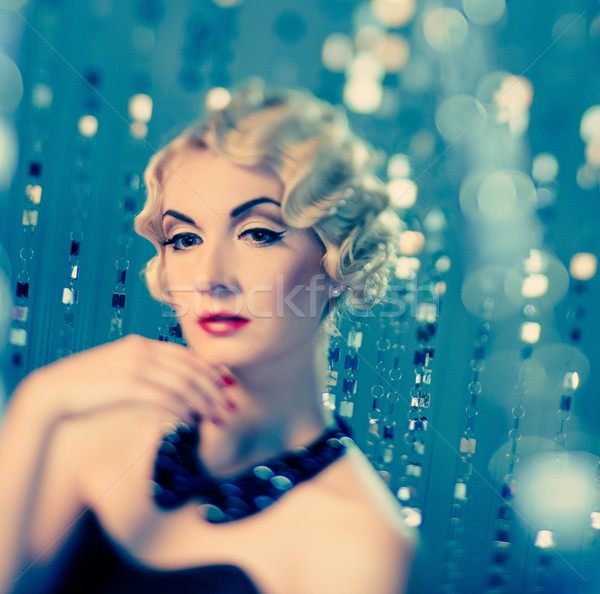 Elegant blond retro woman with beautiful hairdo and red lipstick Stock photo © Nejron
