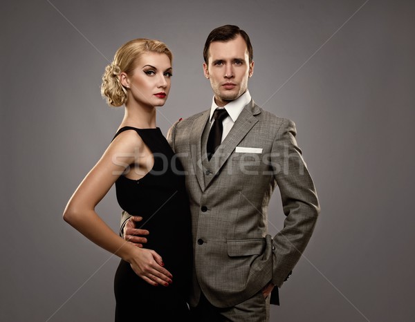 Retro couple on grey background. Stock photo © Nejron