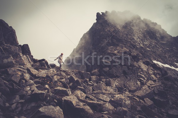 Woman hiker walking in a mountains  Stock photo © Nejron