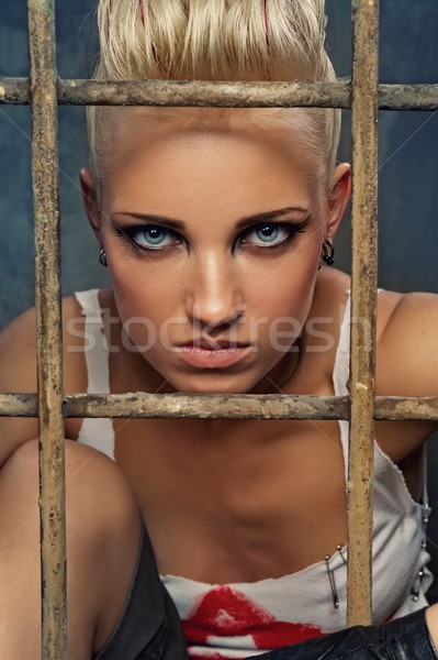 Punk girl behind bars Stock photo © Nejron