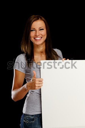 Beautiful young brunette woman with blank notice board Stock photo © Nejron