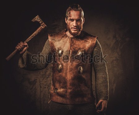 Wounded gladiator with  sword covered in blood isolated on grey Stock photo © Nejron