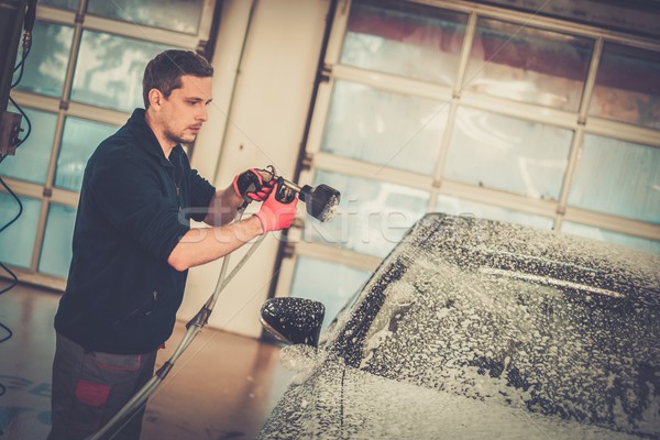 Man worker washing luxury car on a car wash  Stock photo © Nejron